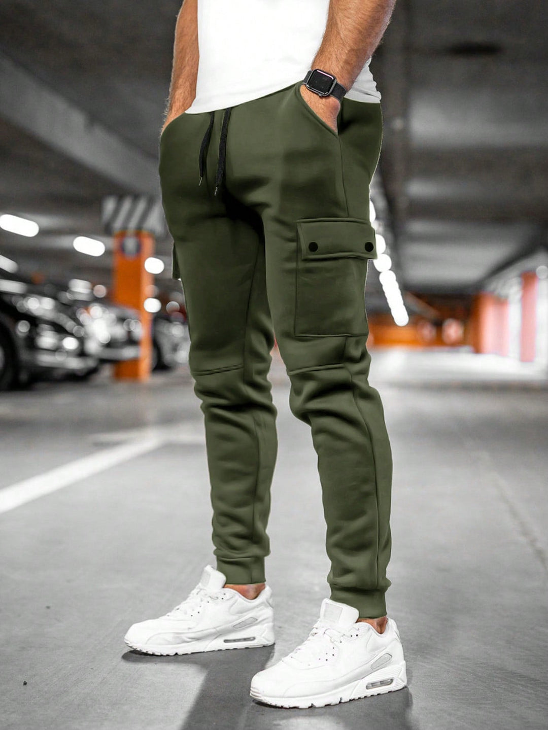 Athletic-inspired men's slim-fit joggers, combining casual comfort with streetwear aesthetics.