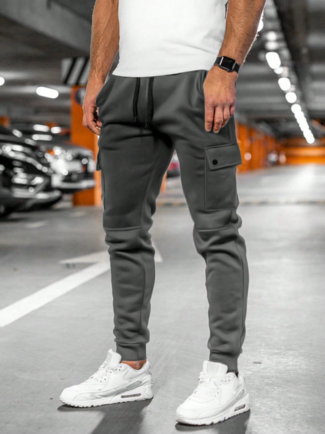 Stylish grey slim-fit men's joggers, blending streetwear and athletic comfort for modern men.
