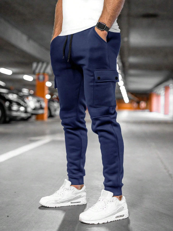 Versatile men's slim-fit joggers, great for gym, casual outings, or elevated streetwear looks.