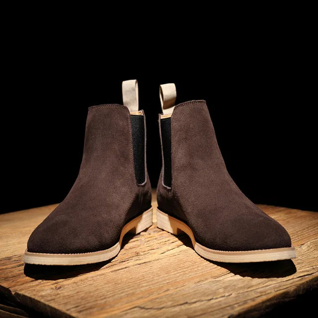 Sleek men's suede Chelsea boots. Classic slip-on ankle boot style, great for versatile casual outfits.