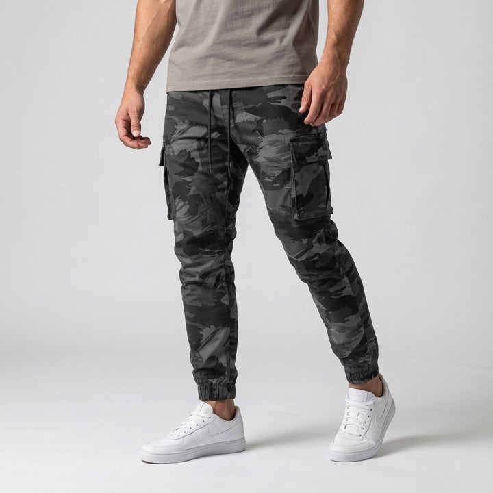 High-quality men's stretch joggers with functional cargo pockets, offering a contemporary tapered fit