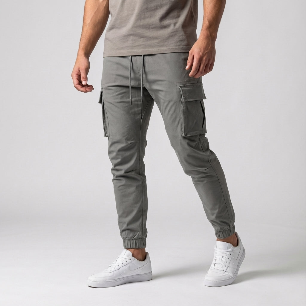 Versatile men's stretch pants with cargo-style pockets, designed for optimal movement and comfort
