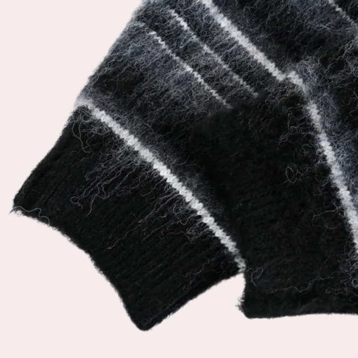 Close-up of men's striped sweater texture, soft knit for cozy comfort. Classic winter style for men.