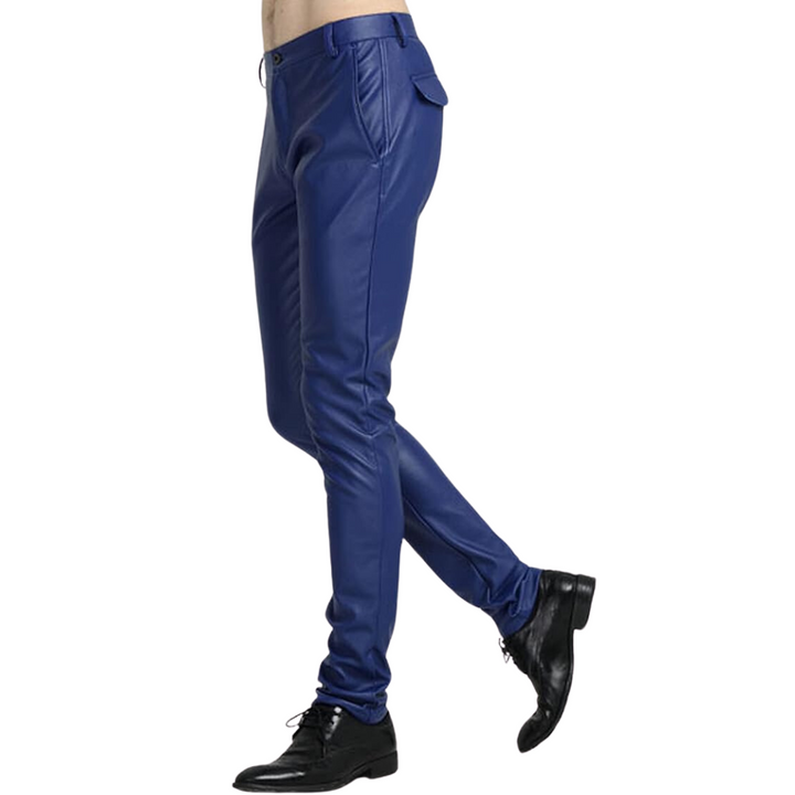 Close-up of men's tapered faux leather trousers, showcasing texture and seams