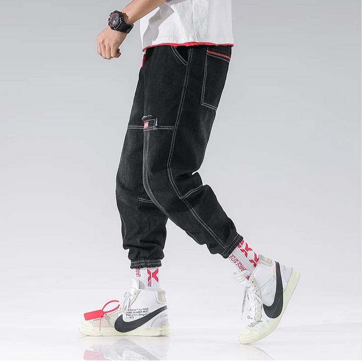 Comfortable men's loungewear jogger pants with a stylish tapered fit, great for relaxation.