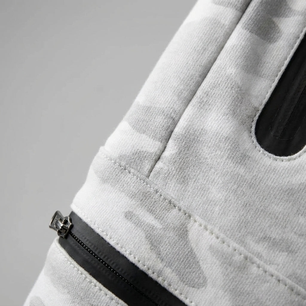 Hector men's tapered track pants in athletic style with functional zip pockets