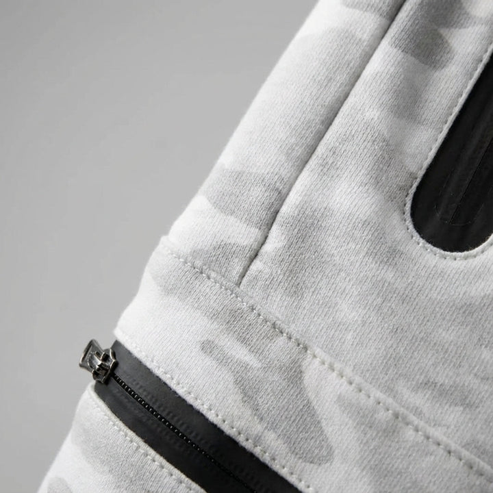 Hector men's tapered track pants in athletic style with functional zip pockets