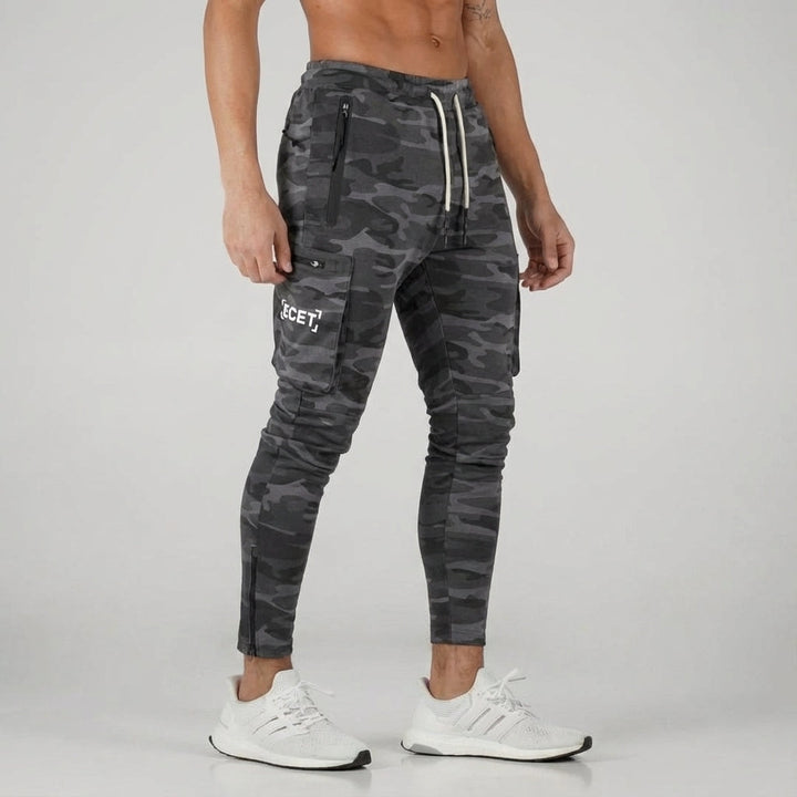 Men's athletic tapered joggers, perfect for sports or casual wear, featuring practical zip pockets