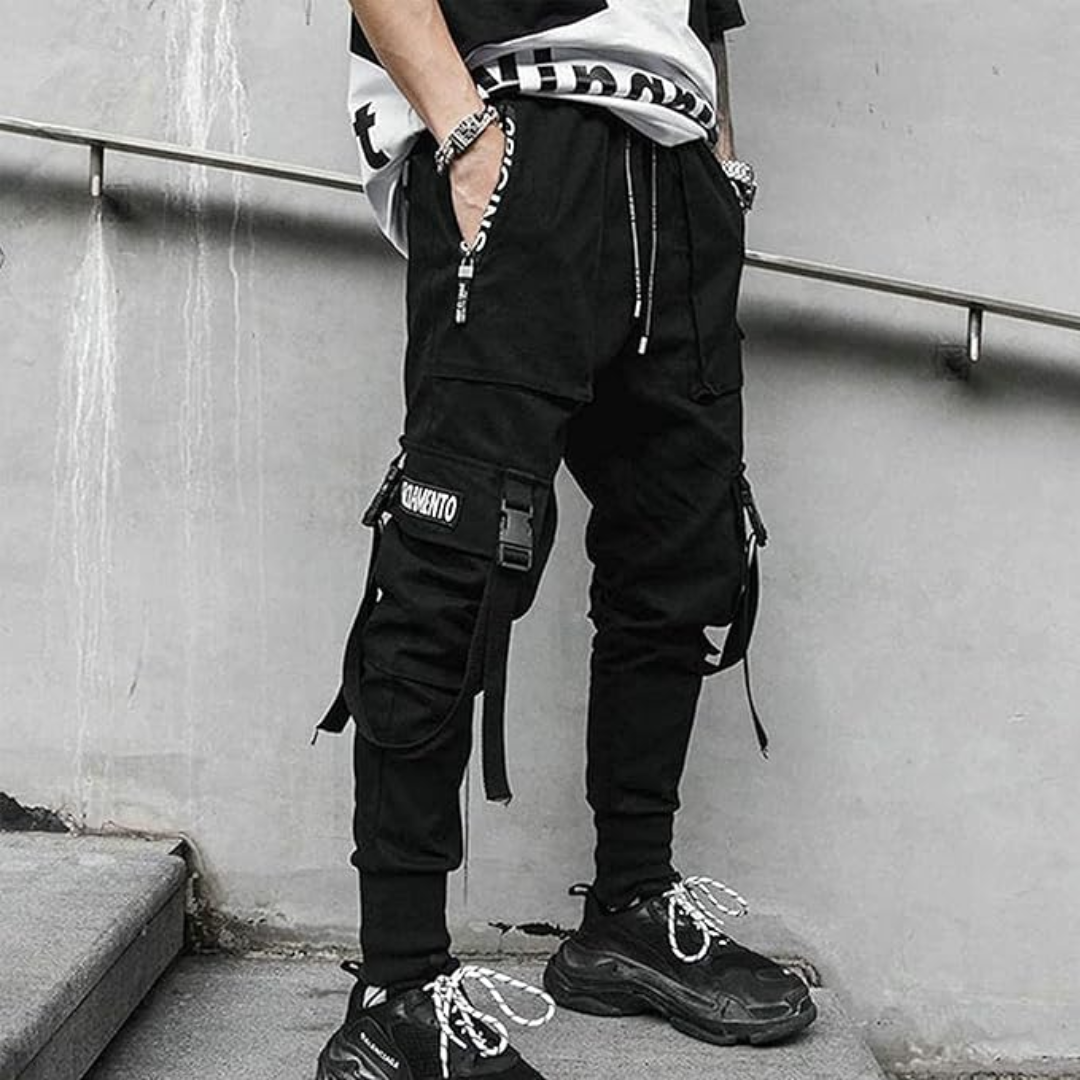 Men's black apparel joggers, techwear tactical aesthetic with a distinctive harem pant silhouette