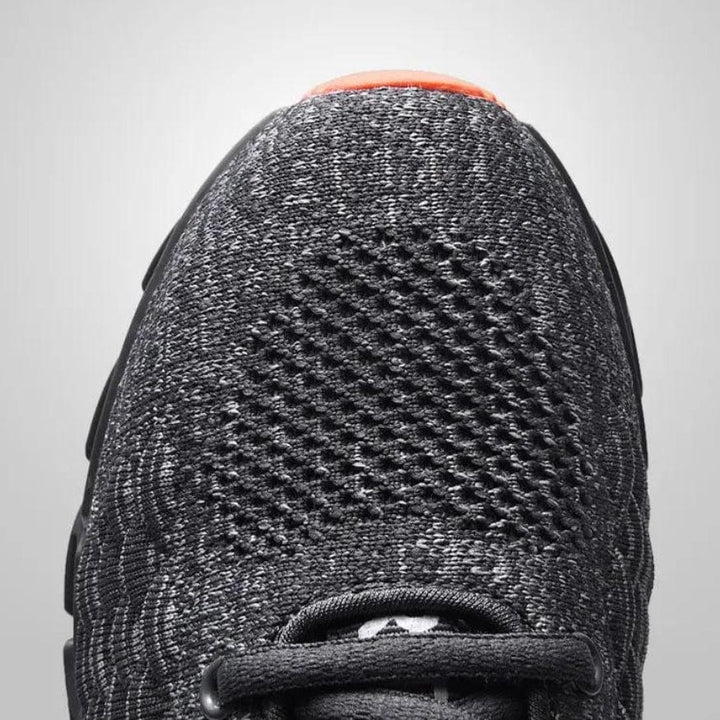 Enhanced arch support in men's black walking shoes, ideal for active everyday footwear & pain relief.