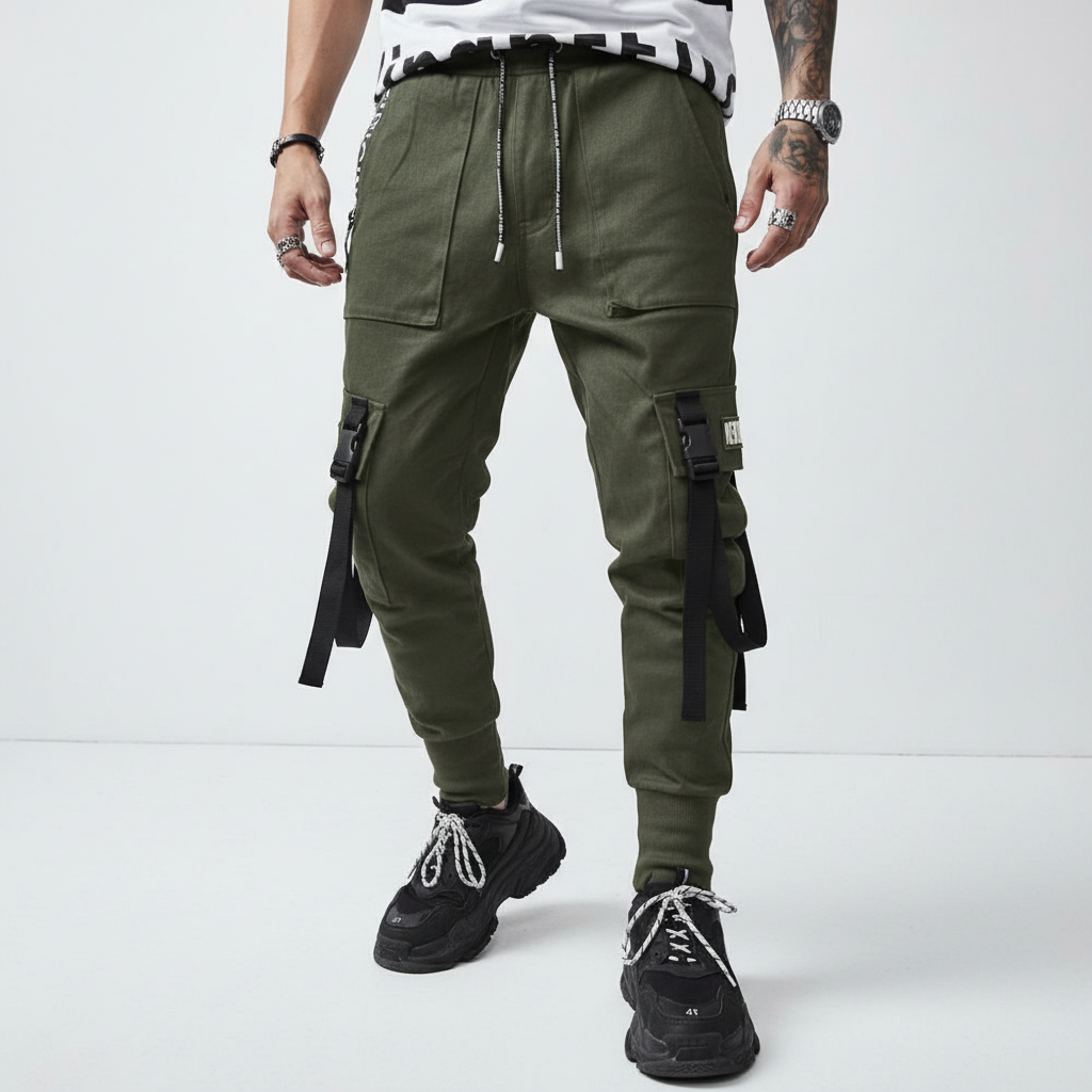 Stylish men's cuffed harem pants in a dark color, perfect for urban streetwear with practical pockets