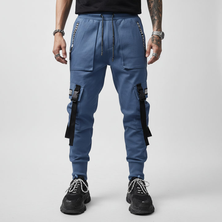 Black men's joggers style harem pants featuring distinctive cargo pockets for a tactical look