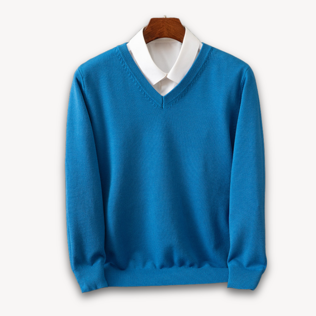 Stylish black V-neck men's sweater, ideal for casual wear. Comfortable long sleeve top for modern layering.