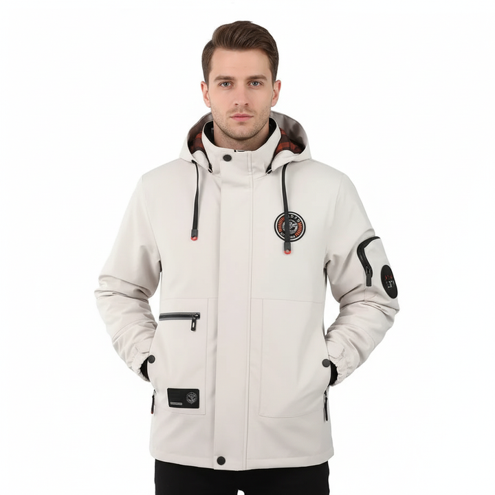 Close-up of a man's grey hooded windbreaker jacket, showcasing waterproof polyester material