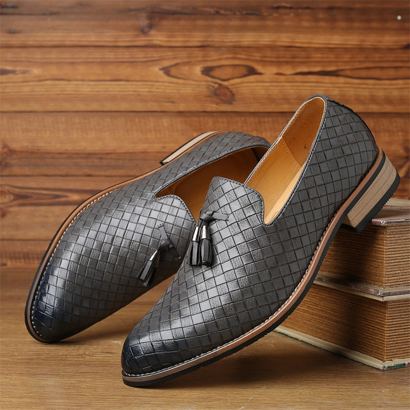 Black men's woven tassel dress loafers, classic footwear for stylish occasions.