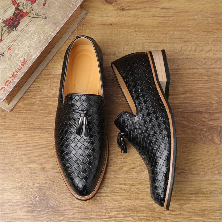 Classic navy men's woven design tassel loafers, elegant formal footwear.