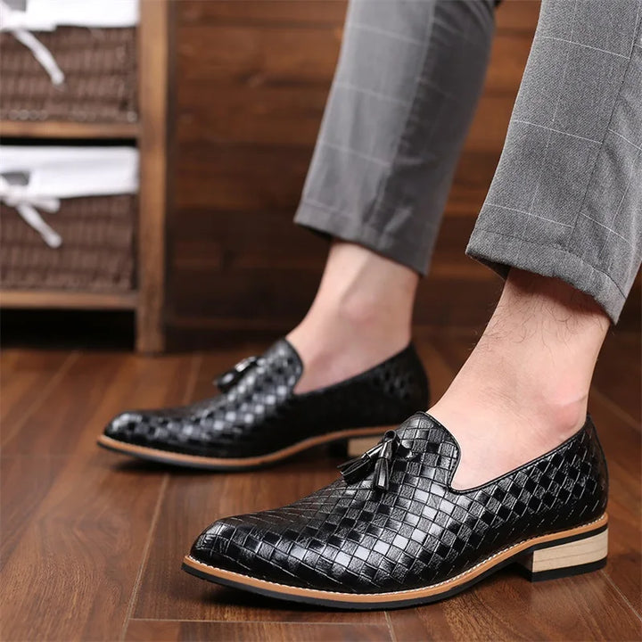 Elegant gray woven tassel loafers, a comfortable slip-on dress shoe for men.