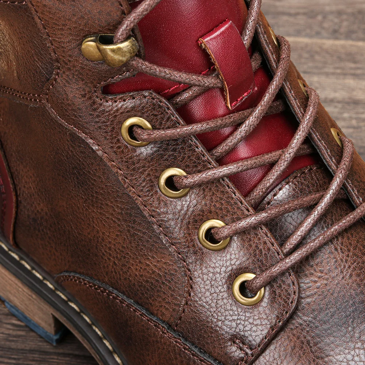 Rich Bordeaux leather men's combat boots, showing high-quality texture & craftsmanship.