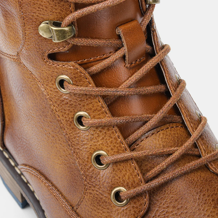 Sturdy sole & tread on comfortable men's Bordeaux combat boots, built for durability.