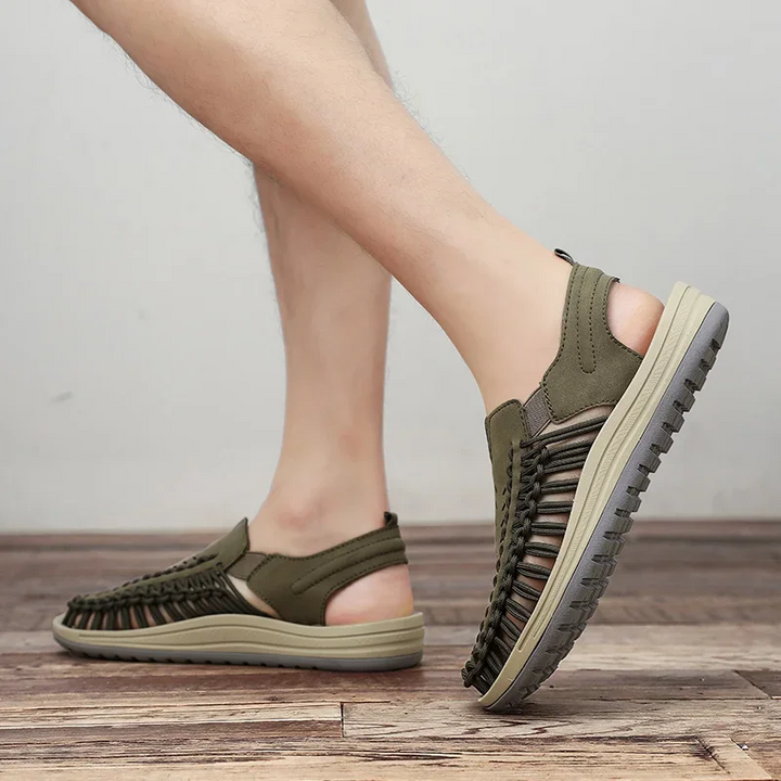 Textured men's braided sandals with breathable straps, designed for all-day outdoor comfort & style.