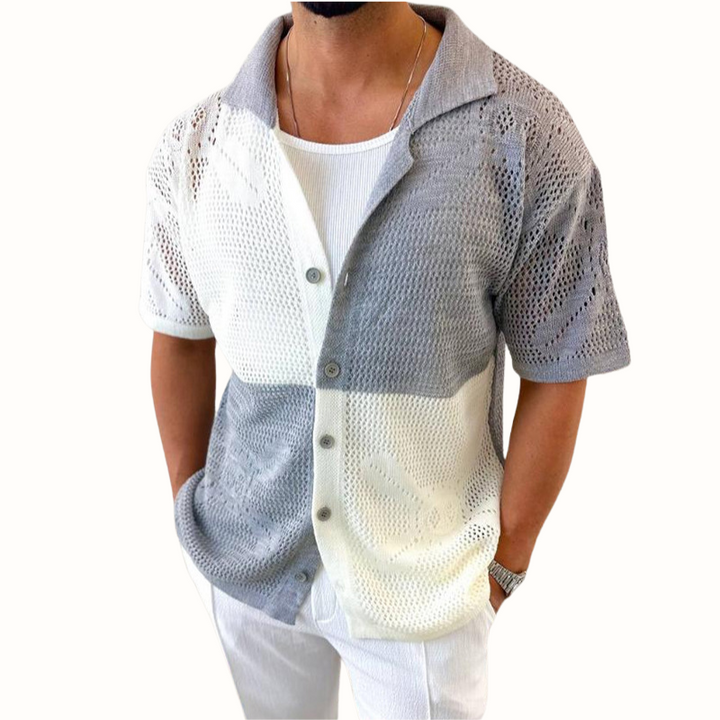 Men's short sleeve mesh shirt, highly breathable with a trendy contrast patch. Excellent for warm weather style.