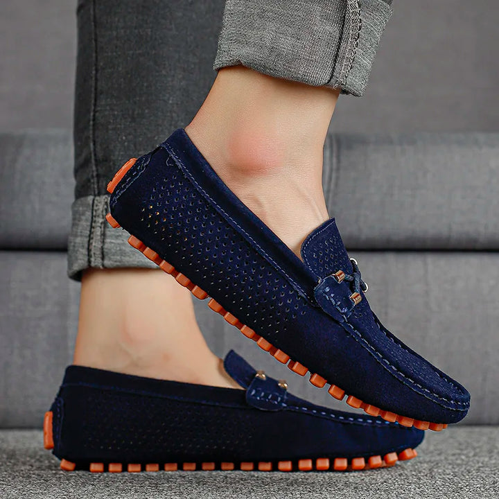 Comfortable men's walking shoes, breathable perforated leather slip-on design.