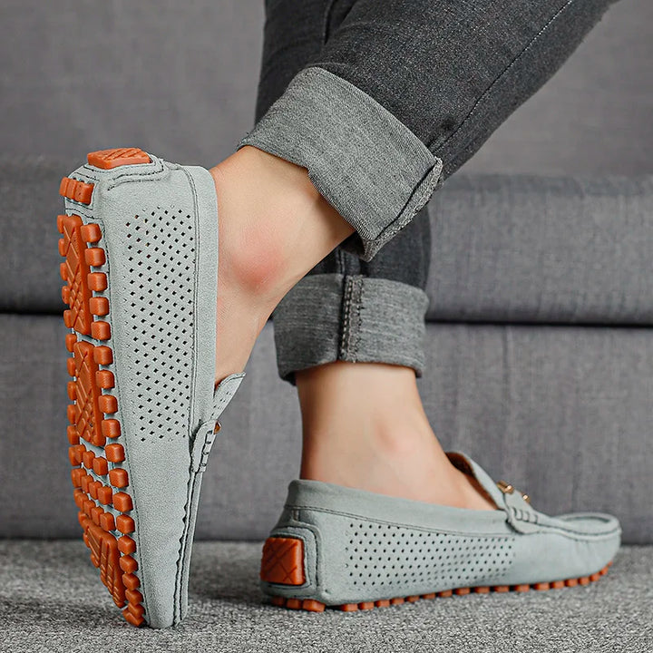 Easy slip-on men's leather shoes, perforated & breathable for all-day casual comfort.