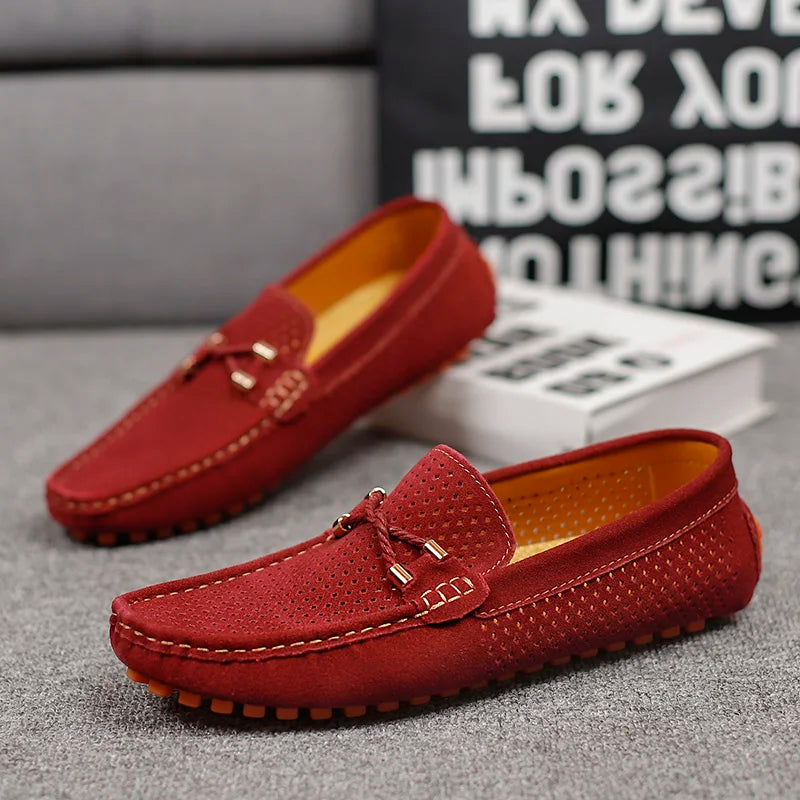 Men's dress casual perforated leather slip-on loafers, offering breathable comfort.
