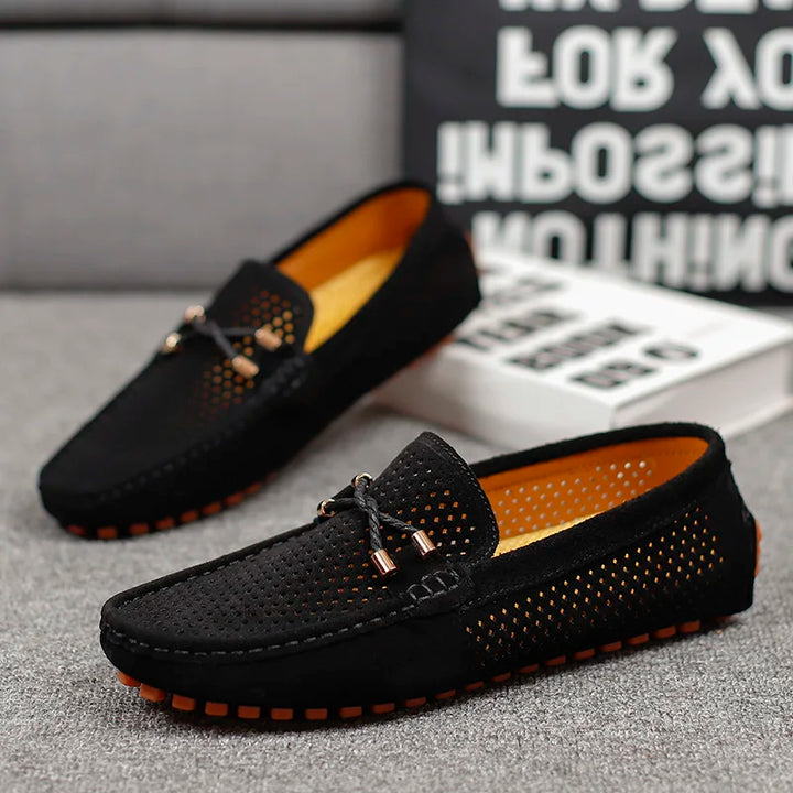 Classic men's perforated leather slip-on loafers, breathable design for everyday wear.