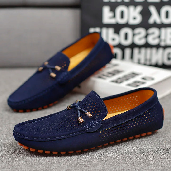 Lightweight men's breathable perforated leather slip-on shoes for walking comfort.