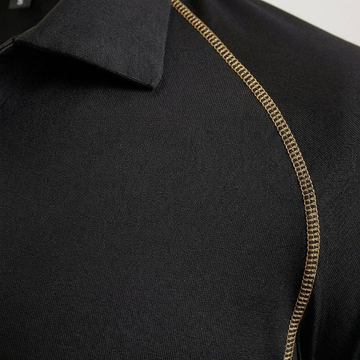 Close-up of breathable fabric on men's performance polo, ideal for active and casual wear