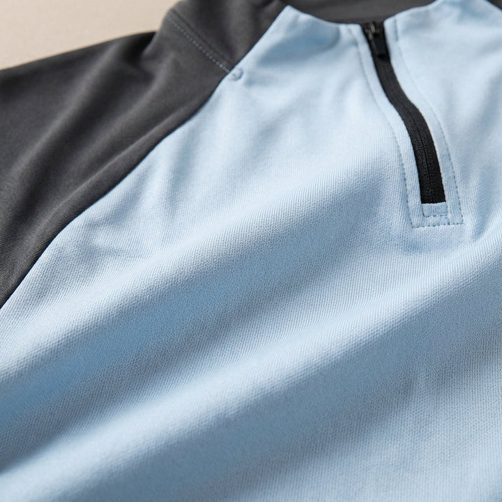 Close-up of men's quick-dry training shirt and shorts, perfect for activewear.