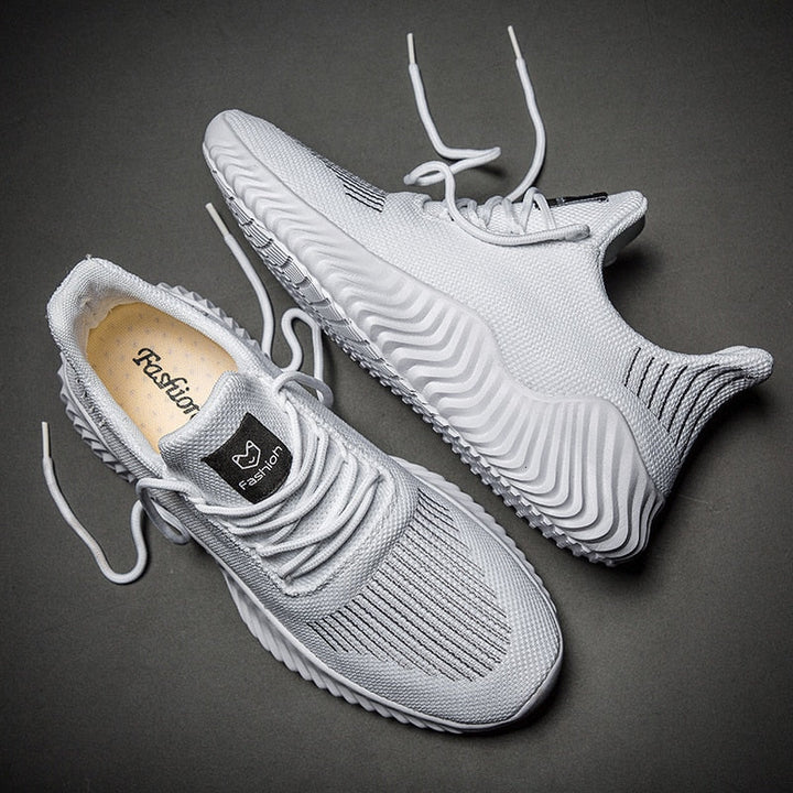 Men's breathable running sneakers with mesh upper, ultimate comfort & performance for athletic training.