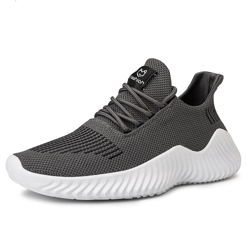Lightweight men's running shoes, designed for ultimate performance and comfort in any sport.