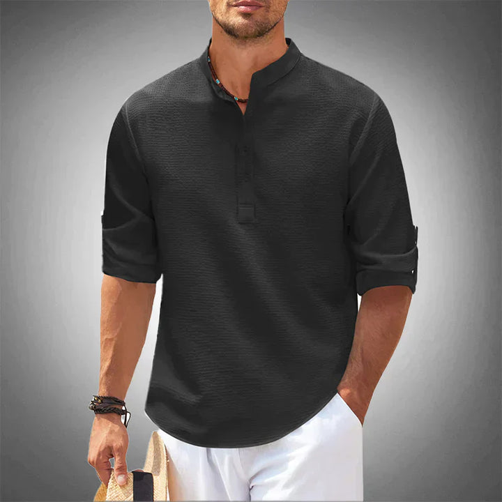Stylish man wearing a blue breathable short sleeve casual shirt, ideal for summer holidays