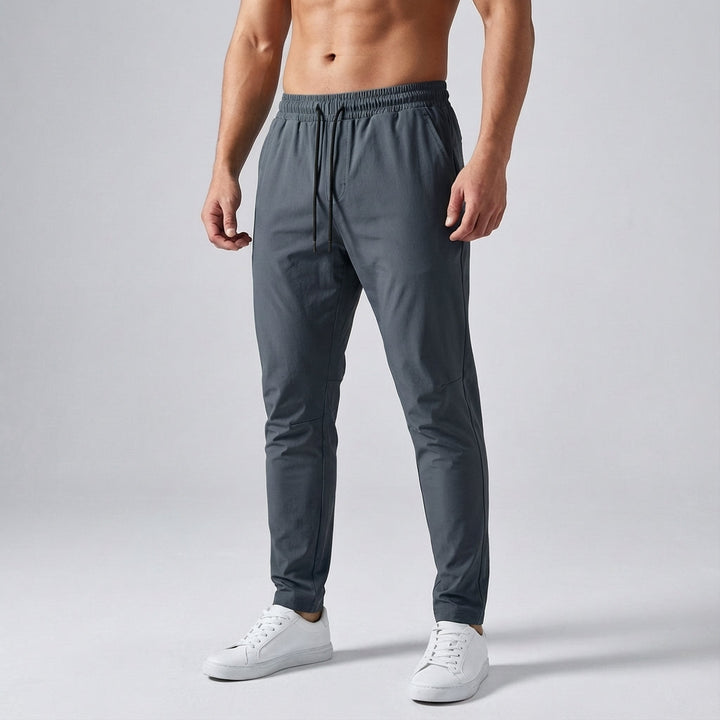Elliot men's performance sport trousers with adjustable waistband, active lifestyle.