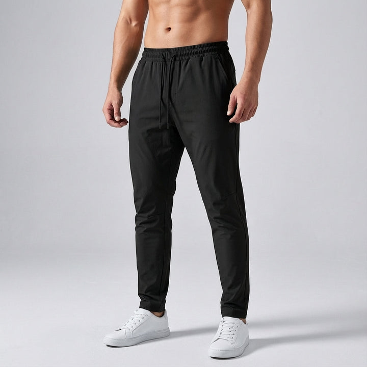 Lightweight men's athletic pants, breathable fabric ideal for running or gym.
