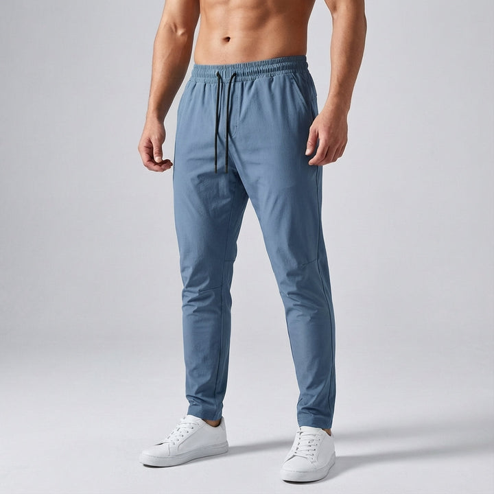 Men's breathable activewear trousers, adjustable waist for optimal comfort, quick dry.