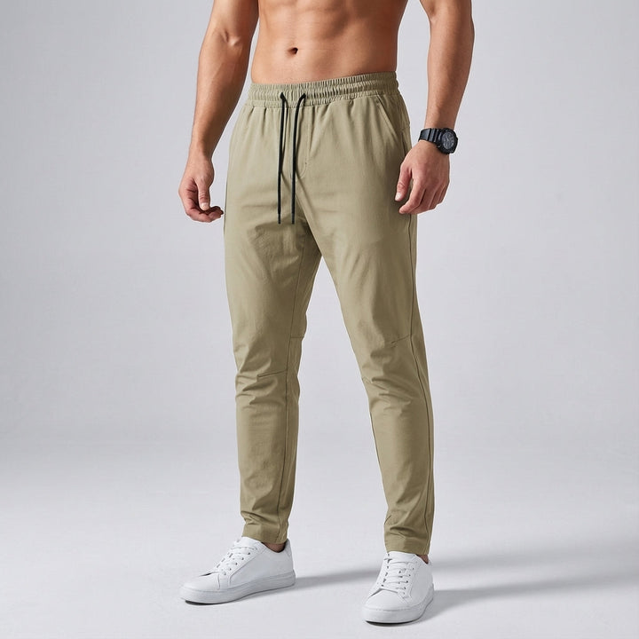 Sporty men's joggers with elasticated waistband, perfect for various activities.