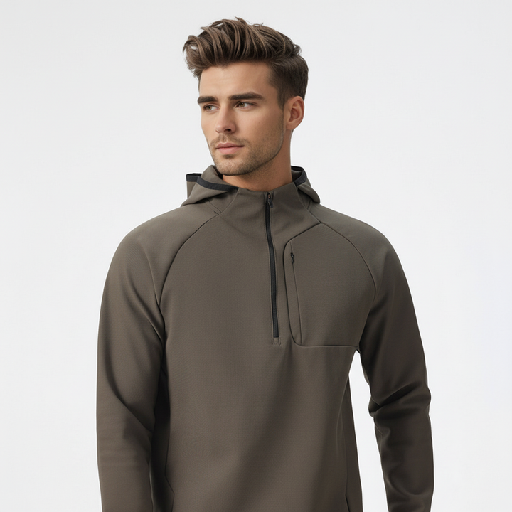 Versatile men's half-zip performance jacket. Breathable stretch fabric for sportswear, training & outdoor gear.