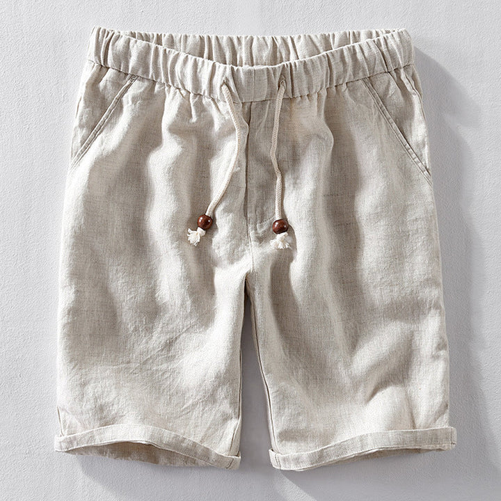 Close-up of men's casual breathable summer shorts in light gray. Relaxed fit for ultimate comfort on warm days.