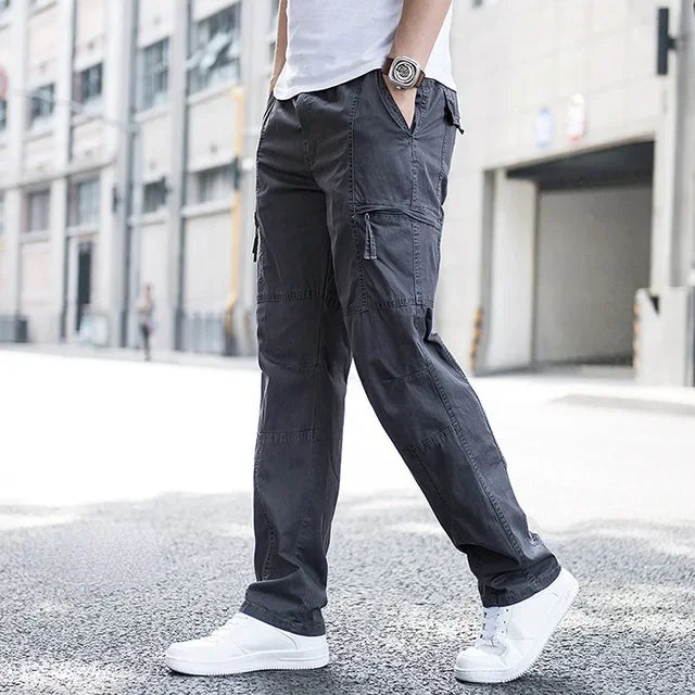 Black men's Brighton Cargo Pants, flexible, multi-pocket design for relaxed fit and versatile everyday style.