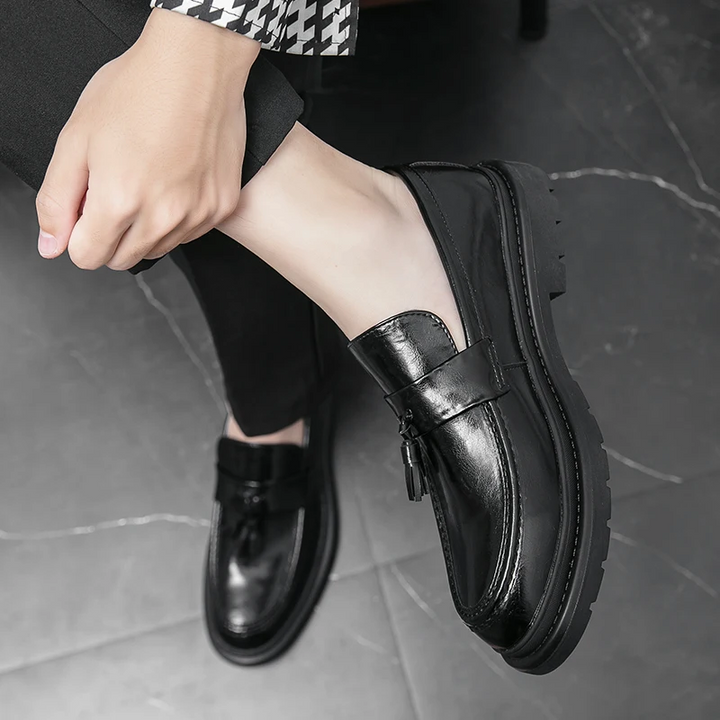 Mens black tassel slip-on loafers, Belmont style, ideal for a polished and comfortable look.