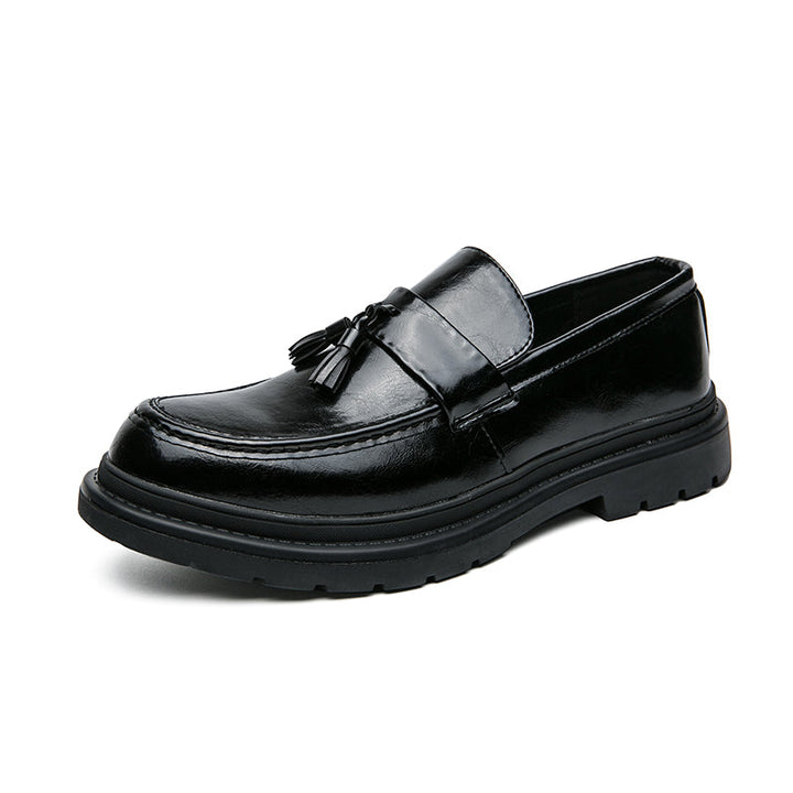 Black Belmont Tassel Loafers, mens dress shoes with a modern lug sole and classic appeal.