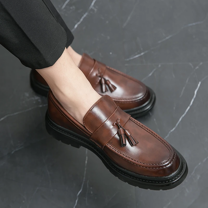 Mens black tassel slip-on loafers, Belmont style, perfect casual or dress footwear.