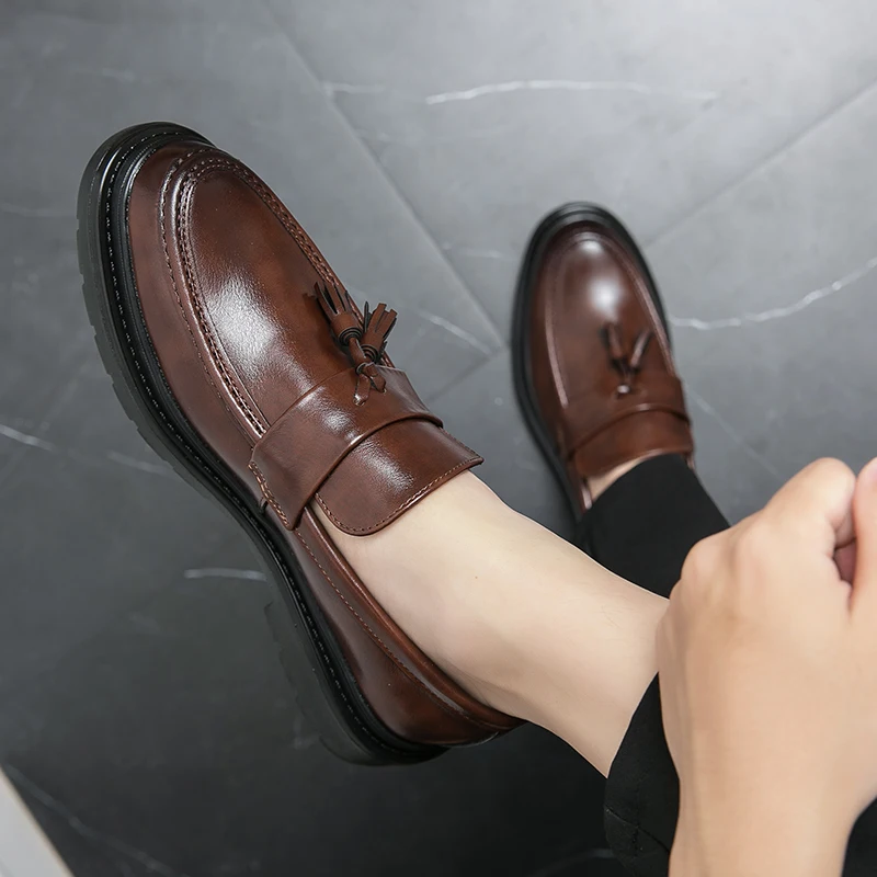 Comfortable brown Belmont Tassel Loafers, versatile mens footwear with a durable lug sole.