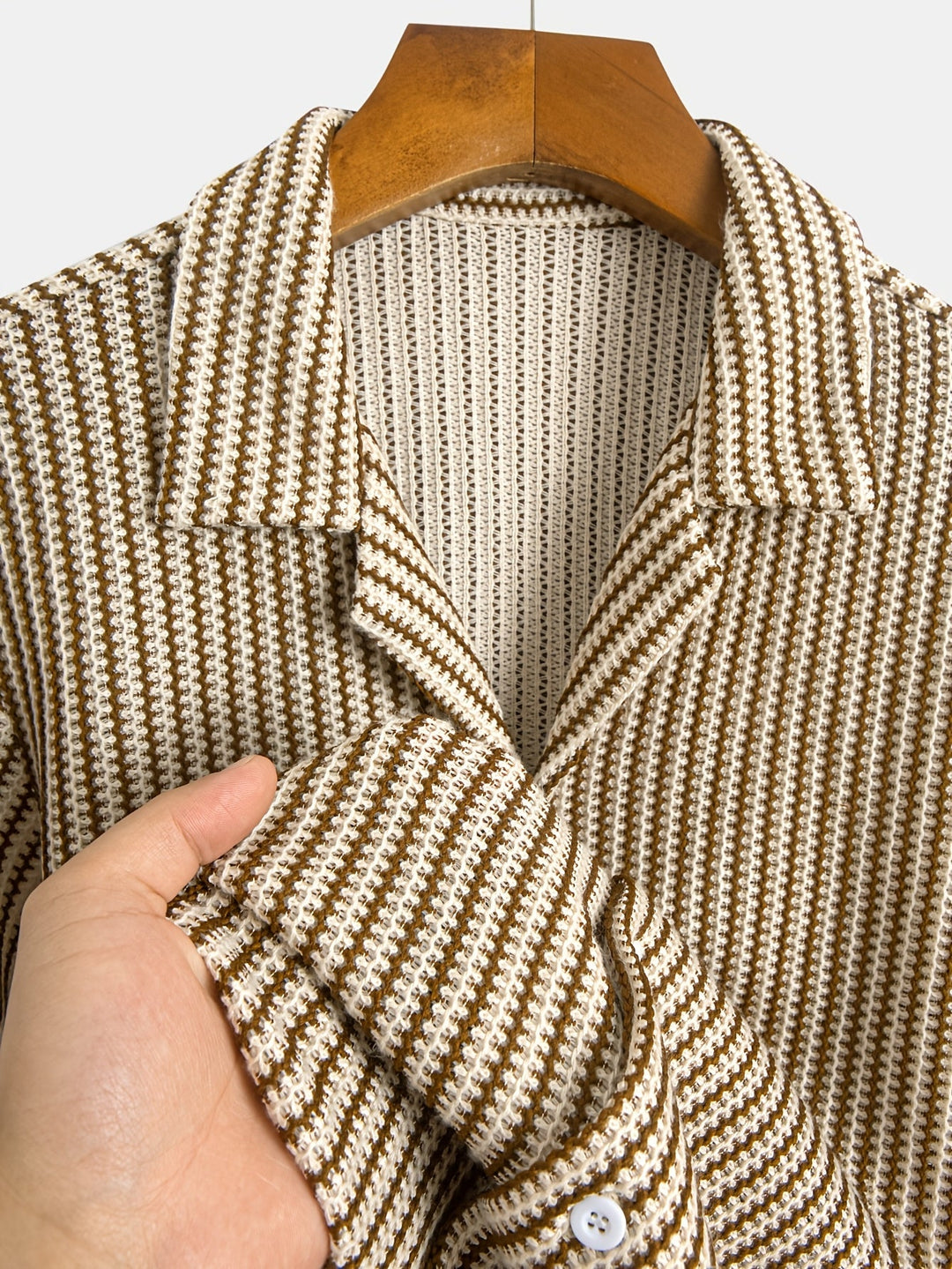 Effortless men's casual brown & black striped knit button-up shirt with short sleeves for relaxed summer wear.