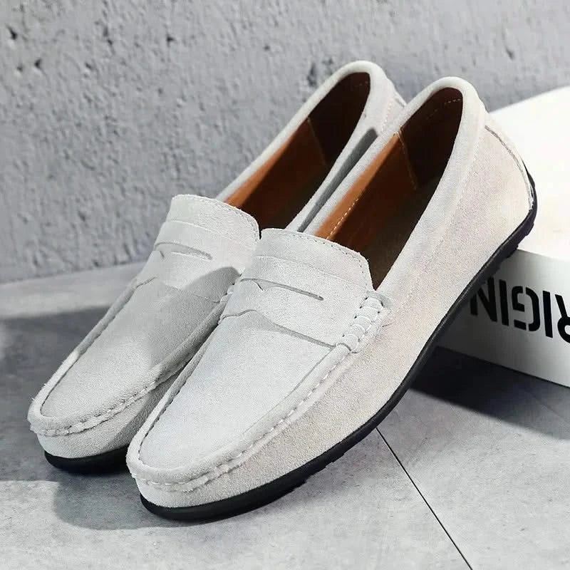 Versatile black slip-on loafers for men, perfect for work or casual outings with ultimate comfort.