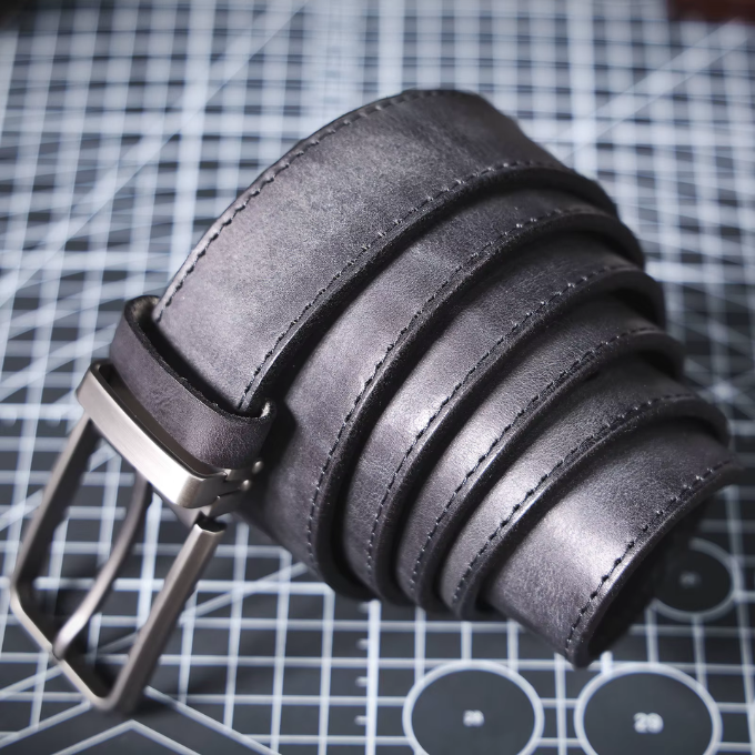 Durable full-grain leather men's belt, Buckhorn design, ideal casual waist accessory.