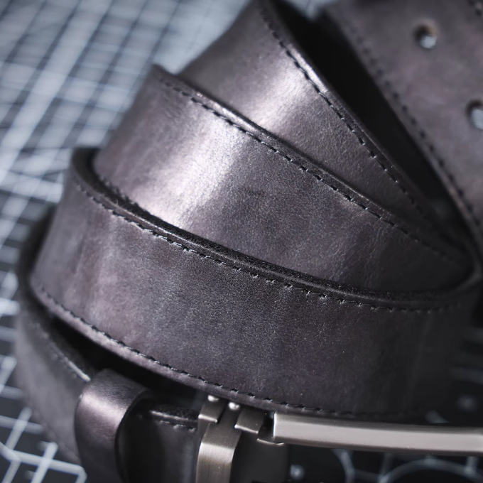 Black full-grain leather men's Buckhorn belt, a classic and durable casual accessory.
